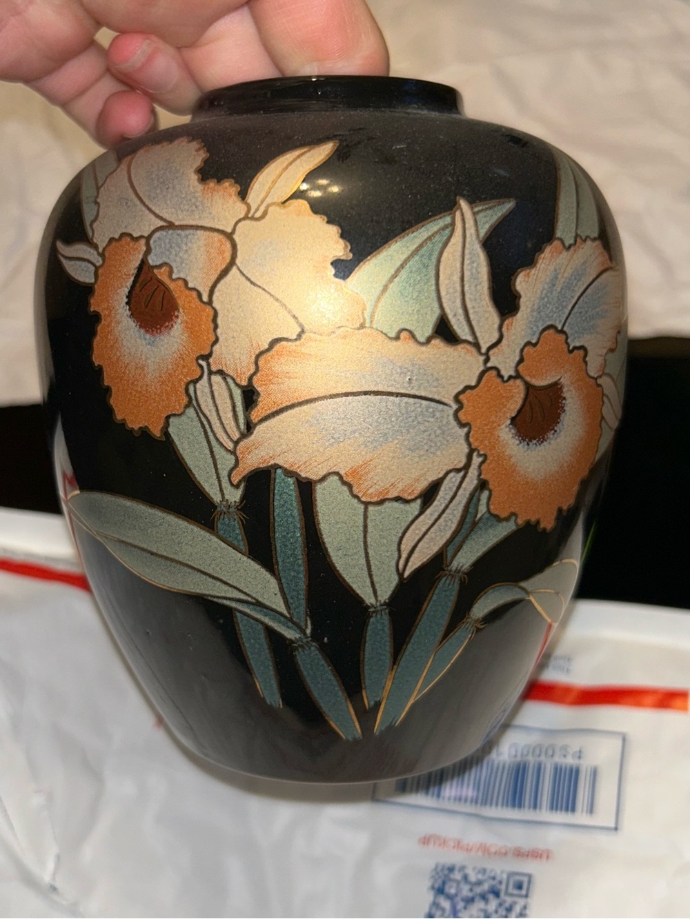 Vintage Japanese black enamel vase with orchid floral design.